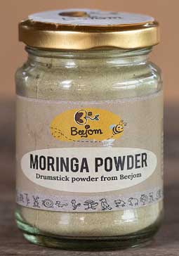 Moringa powder in jar